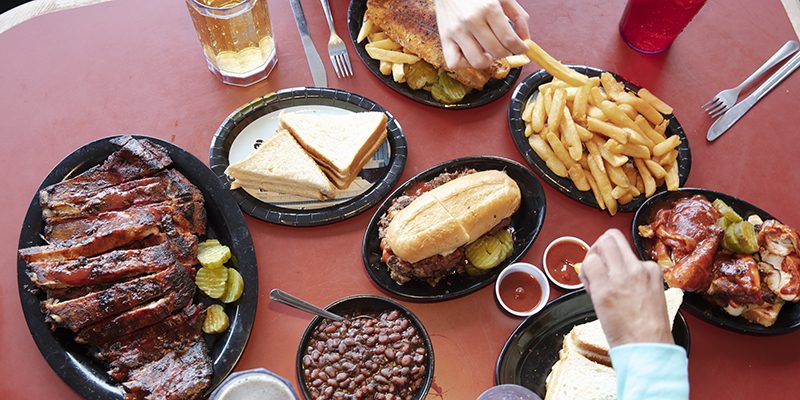 Table full of food at Gates Bar-B-Q