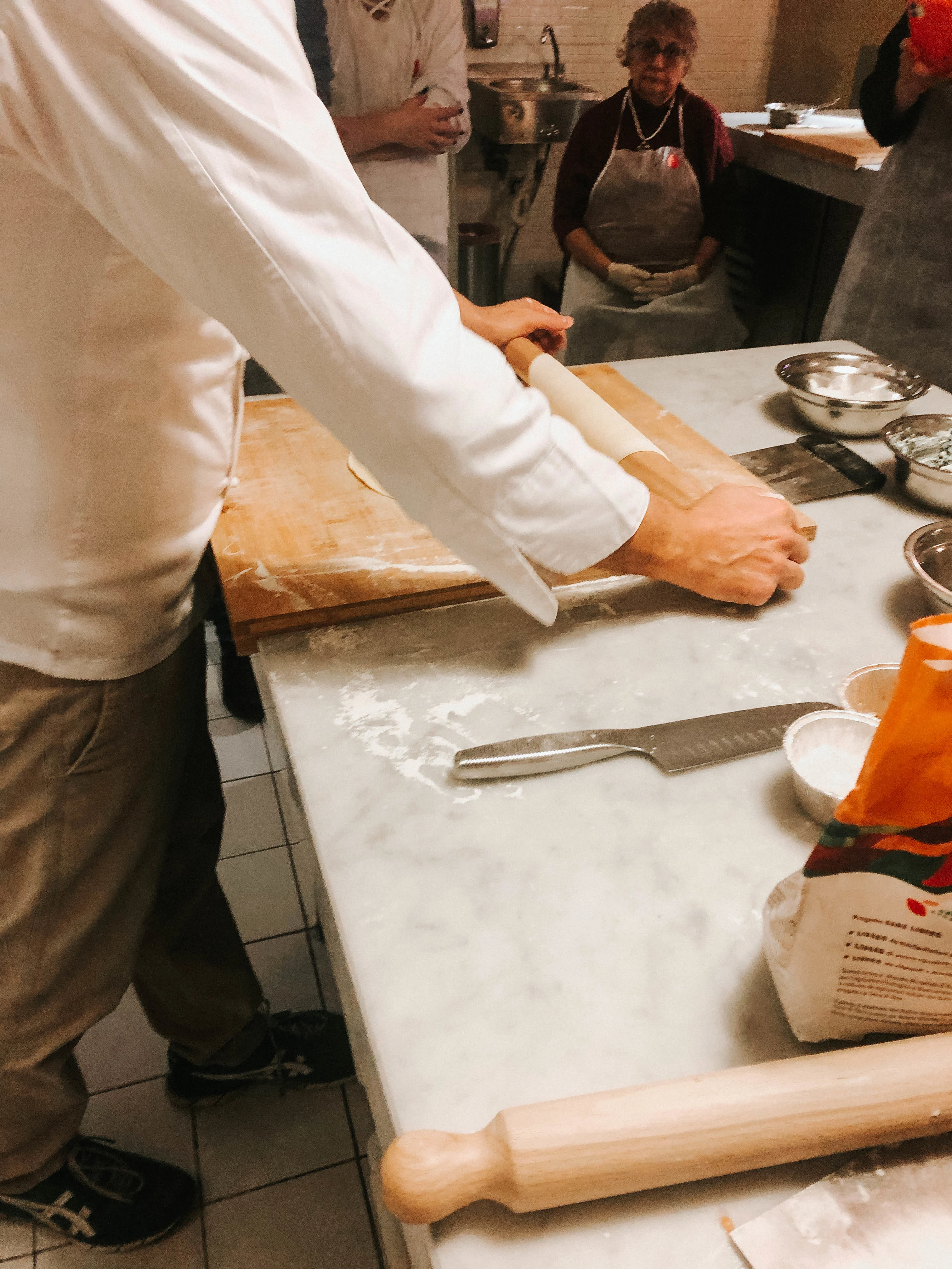 Learning how to make hand made pasta dough pasta making class rome